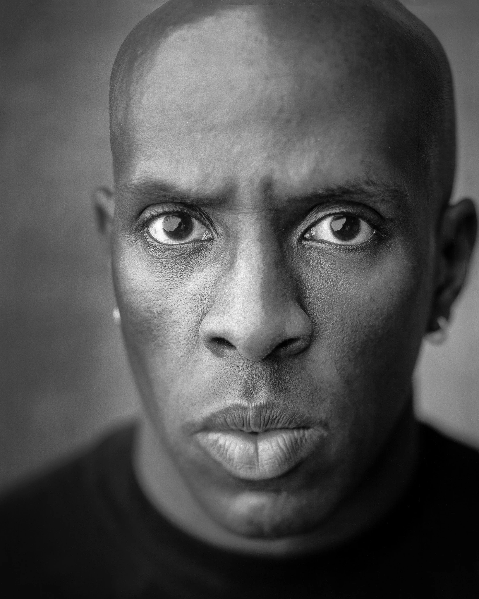 Black-and-white close-up portrait of a man