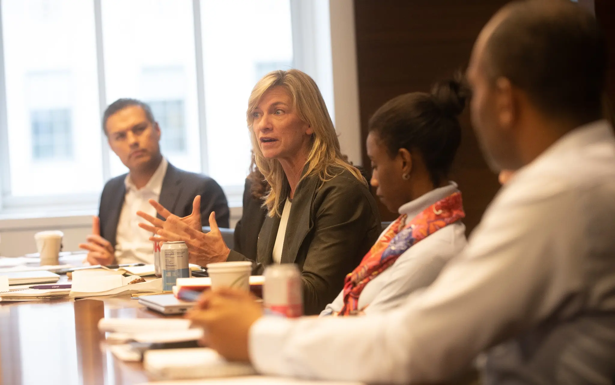 Independence Point Advisors team discussion around the conference table