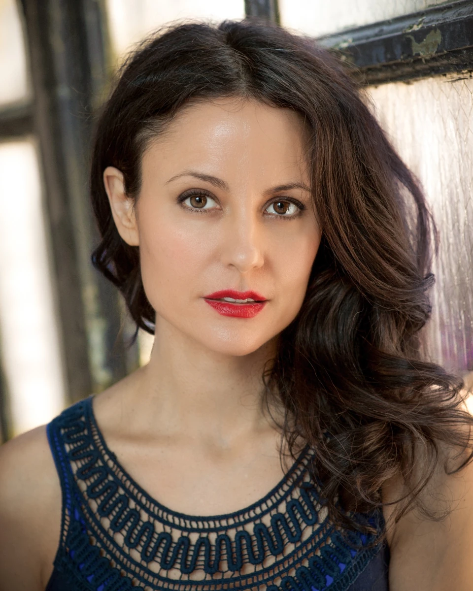 Woman in a blue patterned top