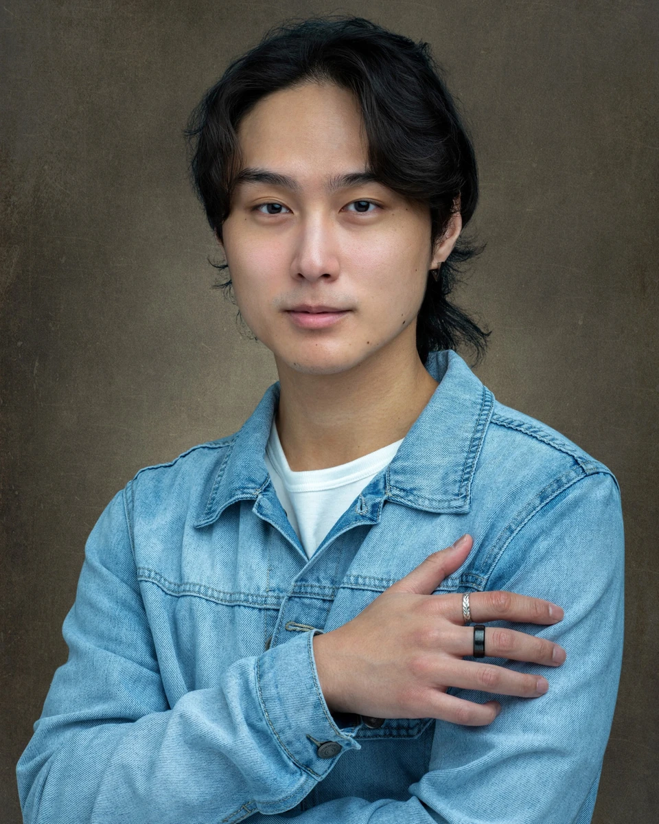 Young man wearing a denim jacket